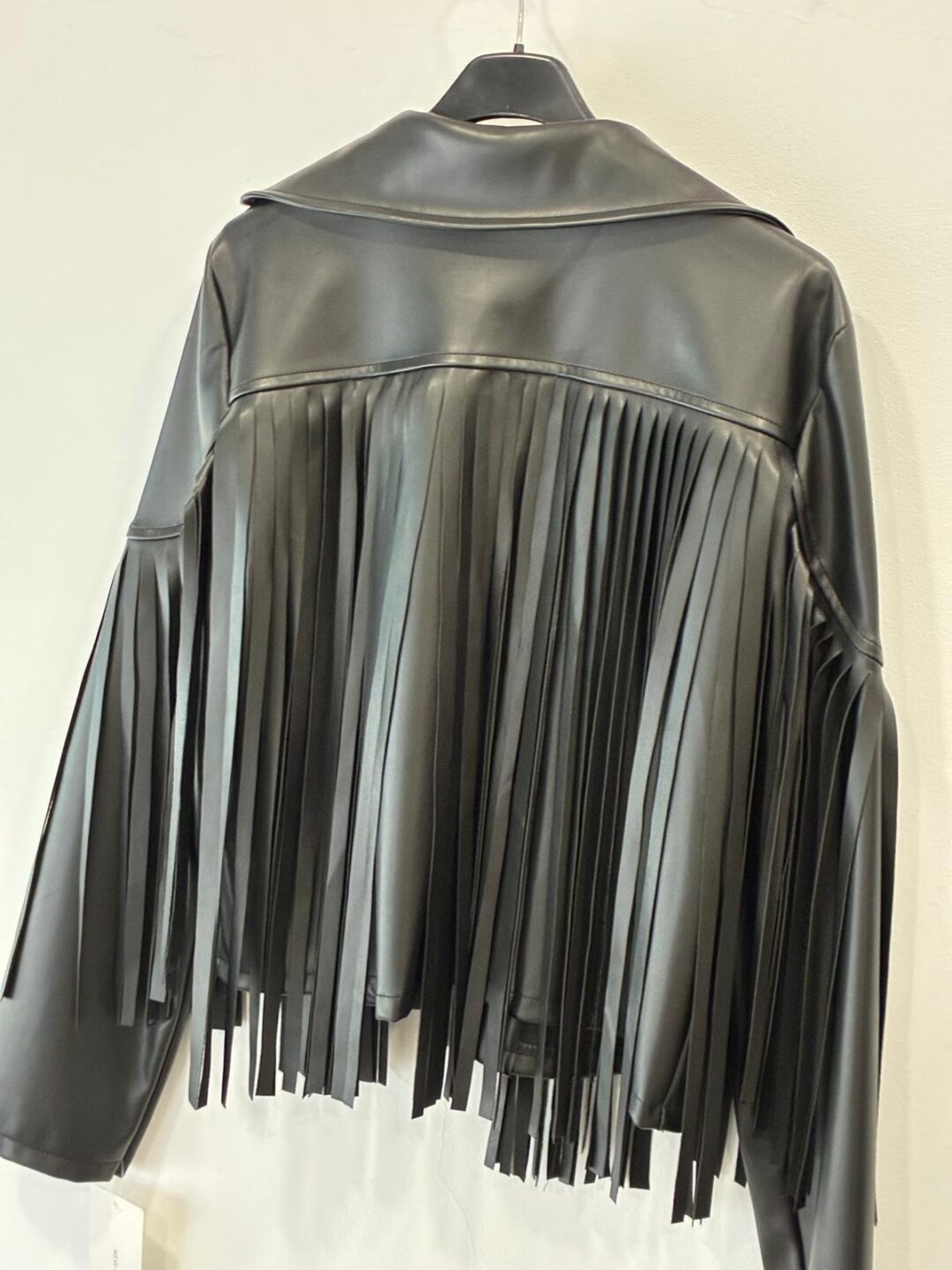 Chaqueta flecos polipiel